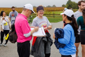 Participants and Shelly Stockmal (Center) of The Victory Bank